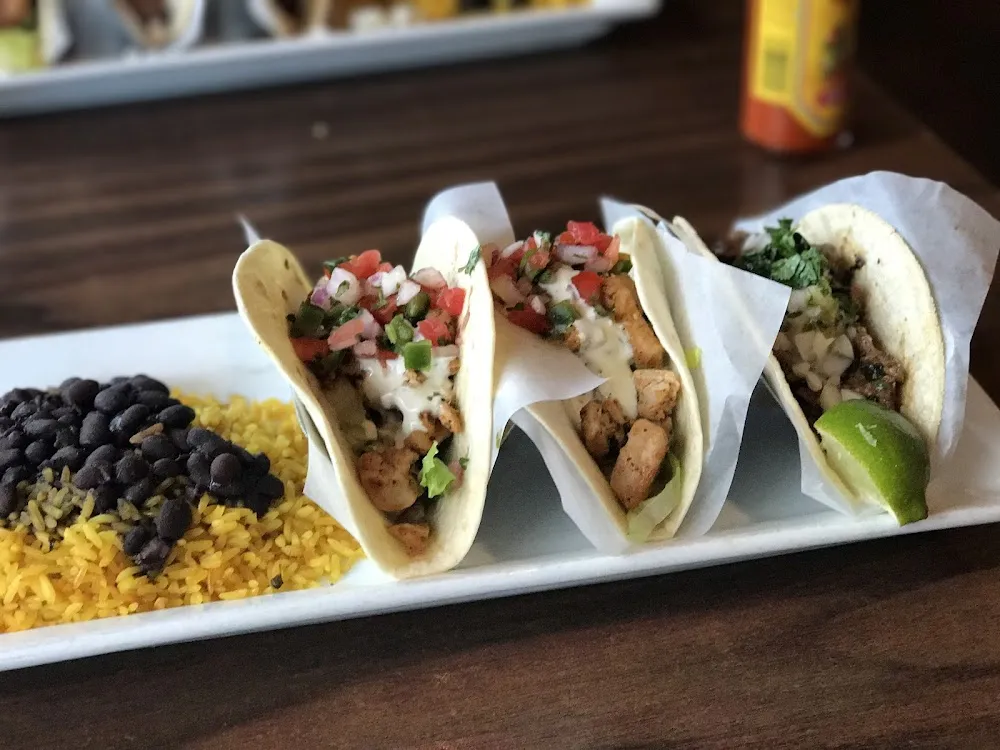 Guy Fierri Approved Fish Tacos with Beans & Rice